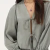 Blouse Verte Brillante Avec Nœuds Et Manches à Volants