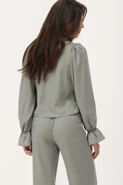 Blouse Verte Brillante Avec Nœuds Et Manches à Volants