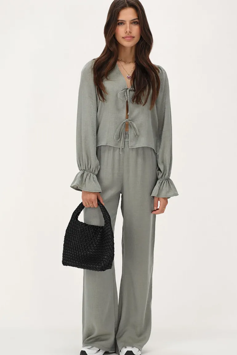 Blouse Verte Brillante Avec Nœuds Et Manches à Volants